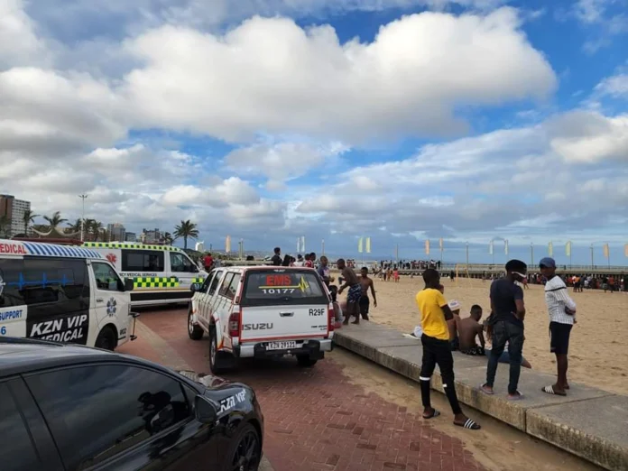 Three dead after freak wave sweeps beach goers against pier at Durban North Beach.